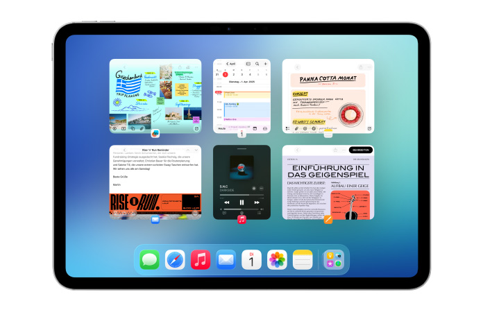 Ein iPad im Querformat, das Display zeigt mehrere Apps wie Kalender und Music in sechs Fenstern, die in zwei Reihen aufgereiht sind, um alle Fenster gleichmäßig anzuzeigen