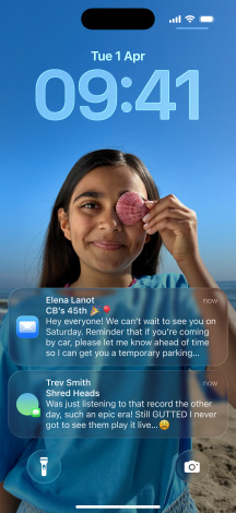 iPhone, five models, each model slightly overlapping the one next to it, far left screen shows a conversation with a background in Messages, second to left screen shows Home Screen with colourful app icons, centre model shows Lock Screen with photo, numerals for time in Liquid Glass, two notifications appear on bottom of screen, second to right model shows clear Liquid Glass app icons, far right model shows music player in Liquid Glass
