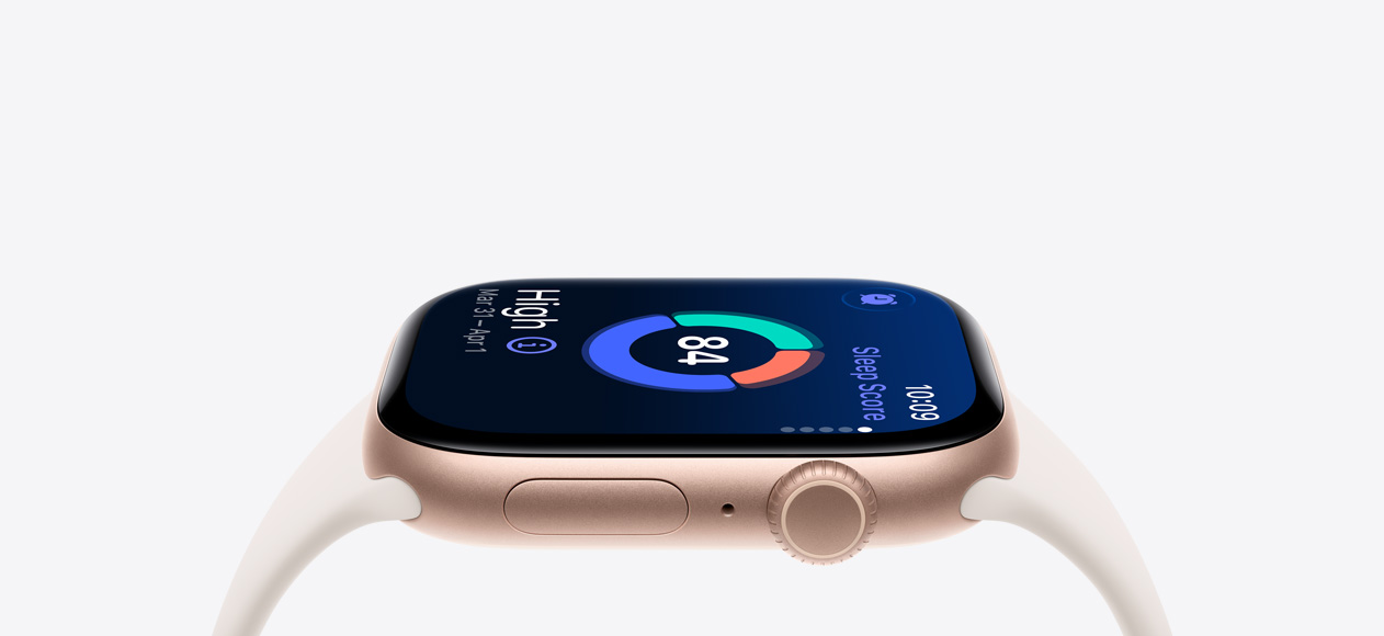 Apple Watch Series 11，玫瑰金色鋁金屬錶殼配星光色運動錶帶，展示右側外觀、數碼錶冠、咪高風、側邊按鈕，手錶螢幕顯示睡眠分數