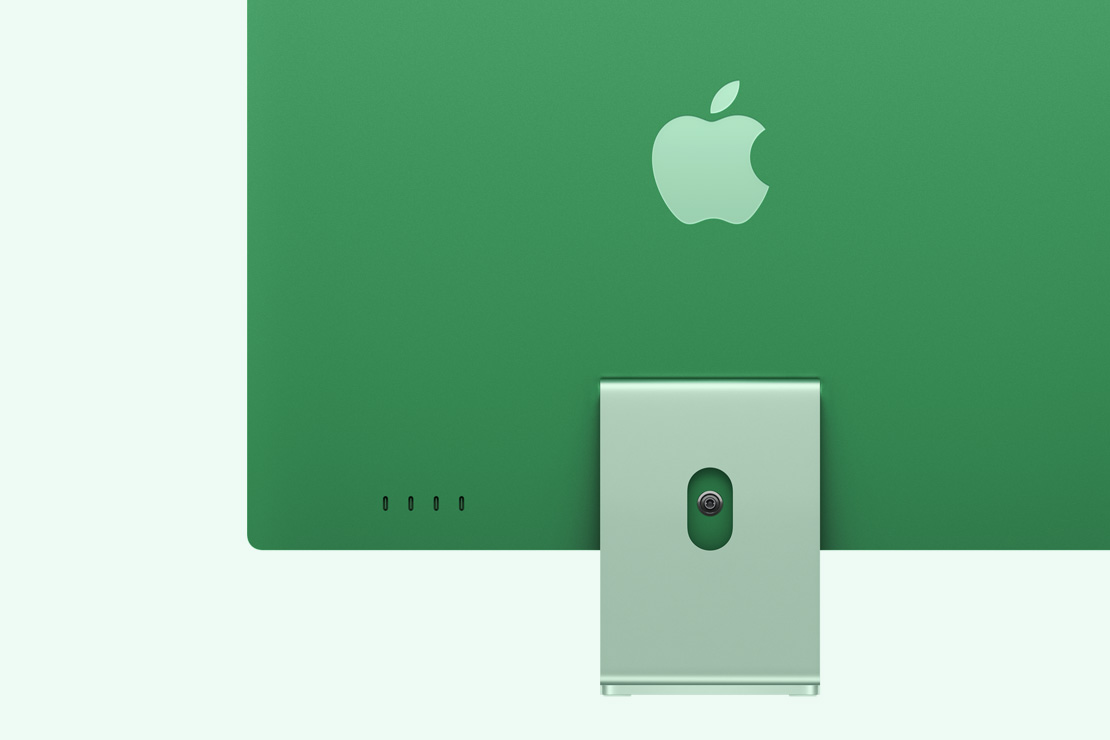 Vue de l’arrière d’un iMac vert mettant en évidence les 4 ports USB‑C 